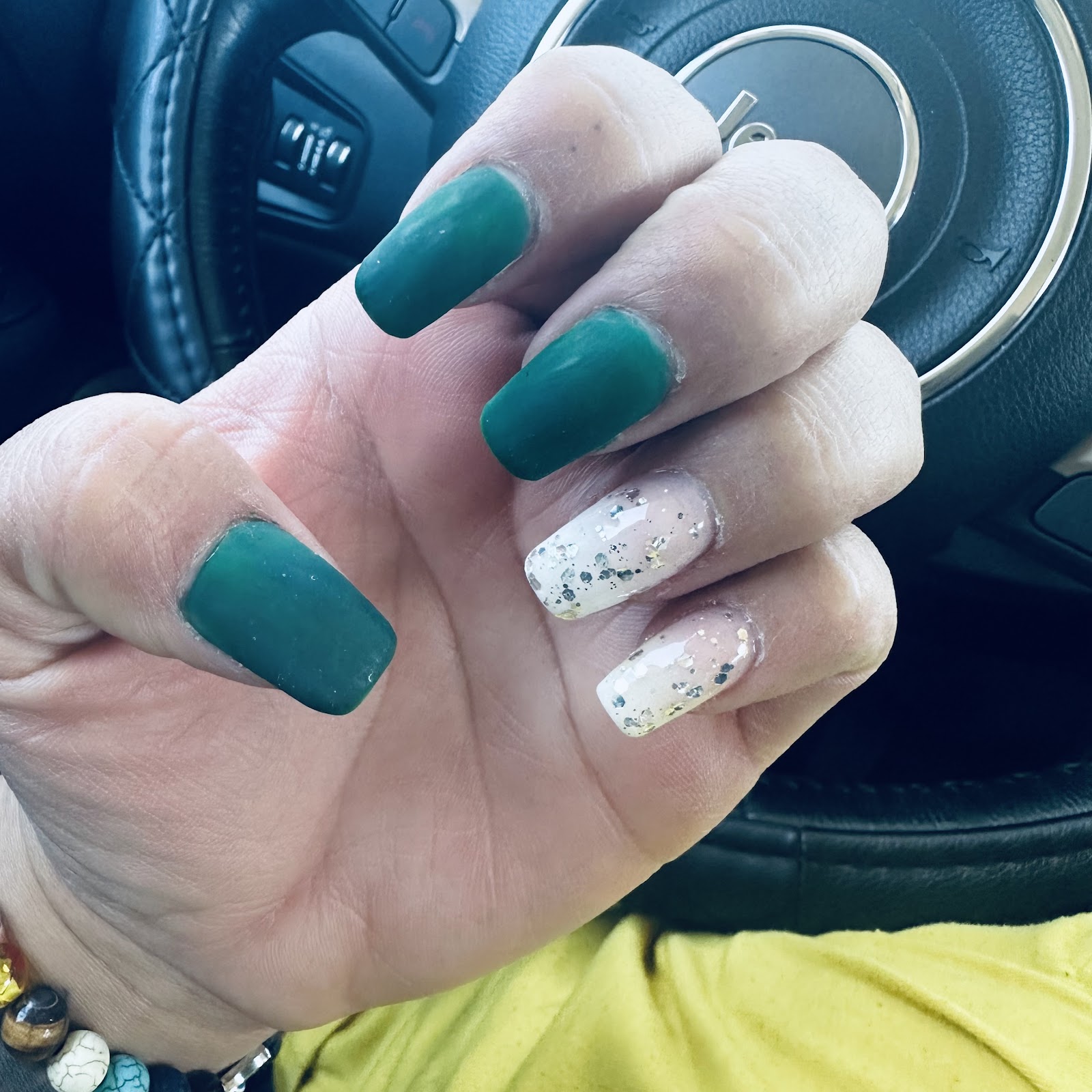 N.V. Nails & Spa logo